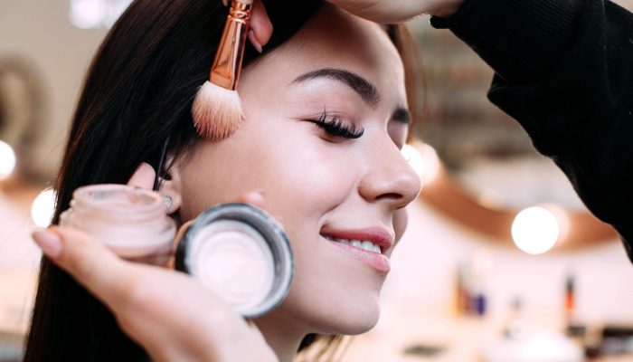Woman makes shade on girl's skull